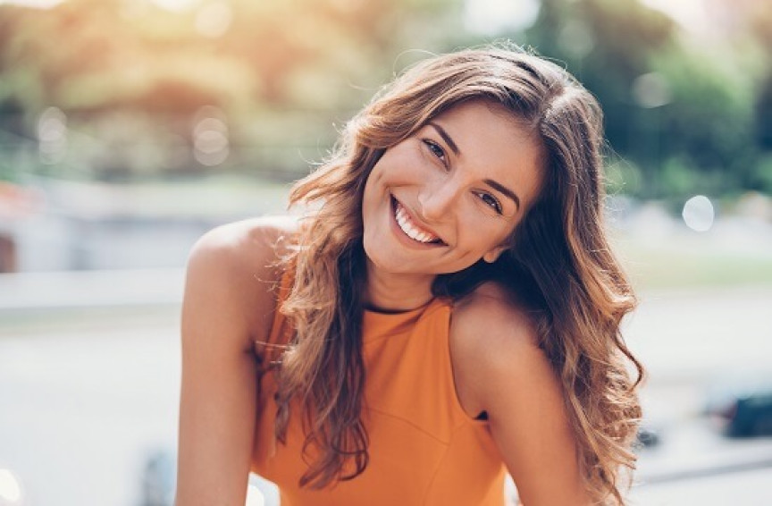 Woman smiling in the sun