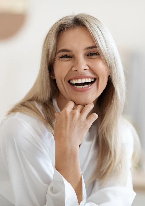 smiling woman with long blonde hair