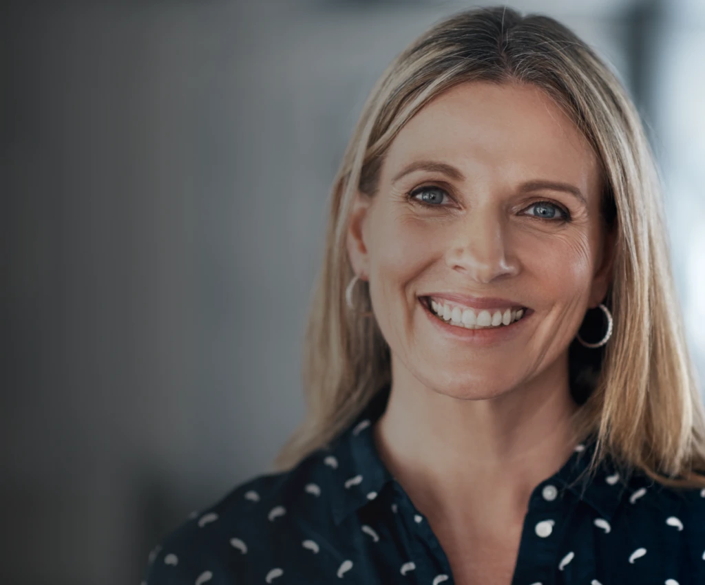 smiling woman with long blonde hair