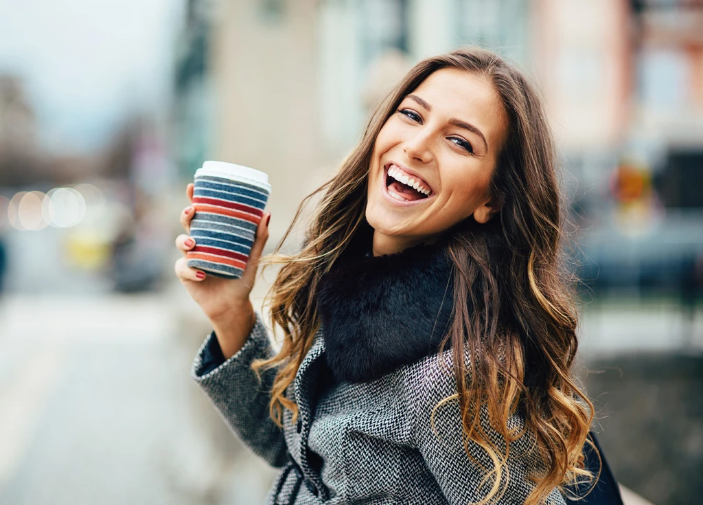 Woman with coffee cup