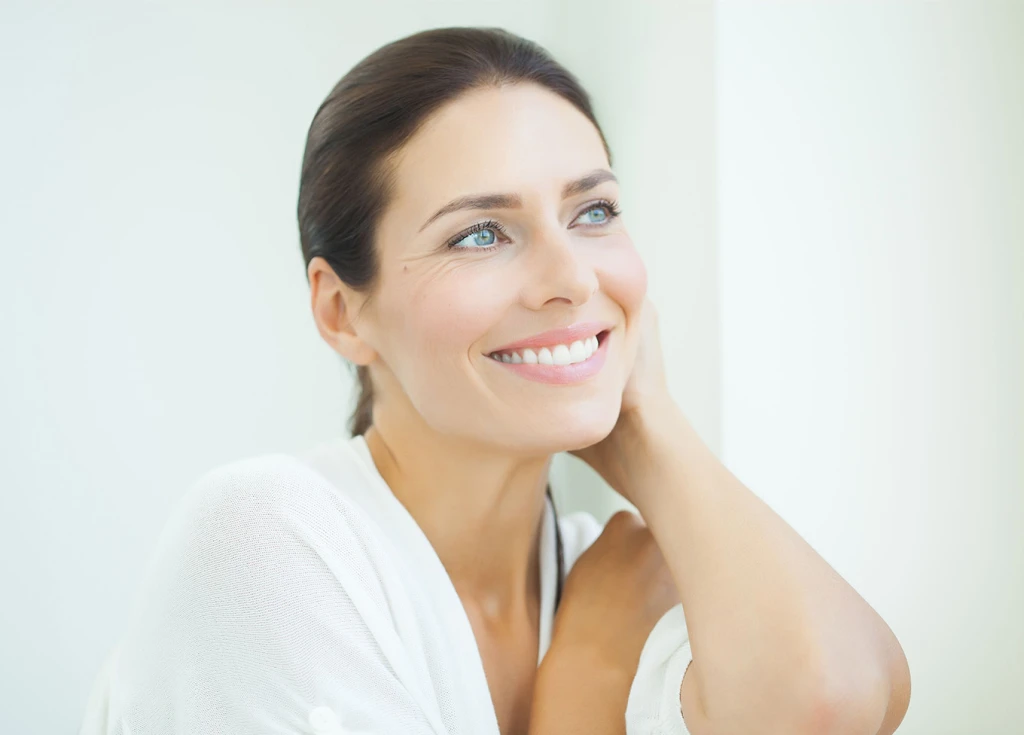 Woman smiling in mirror